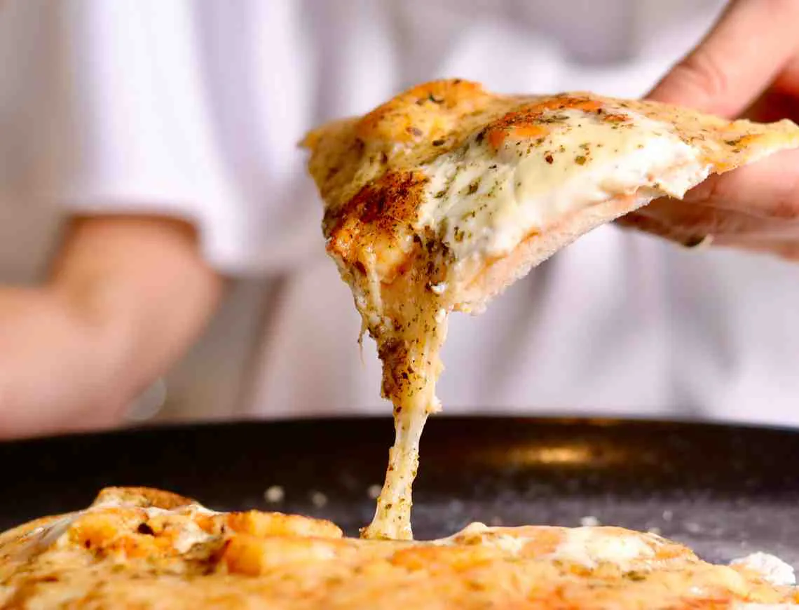 Pizza with melting cheese