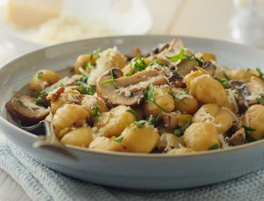 Homemade gnocchi with mushrooms