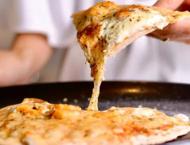 Melted cheese on pizza