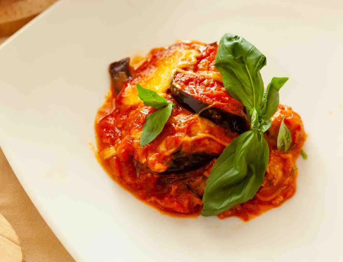 Eggplant parmigiana and fresh basil